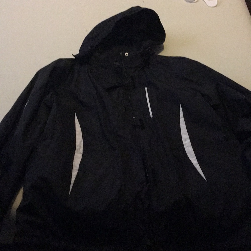 Women's black snow jacket with white stripes
